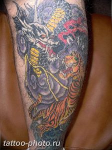 фото тату тигр и дракон 07.12.2018 №024 - tattoo tiger and dragon - tattoo-photo.ru